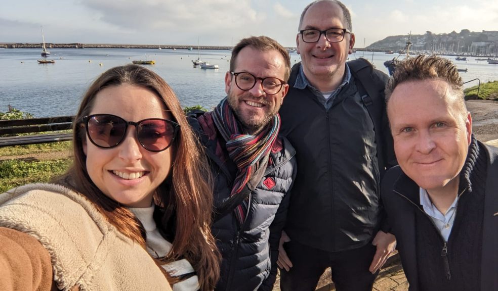 Group of people by the coast